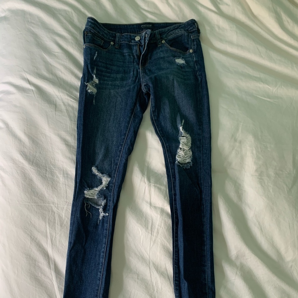 Ripped low rise skinny jeans